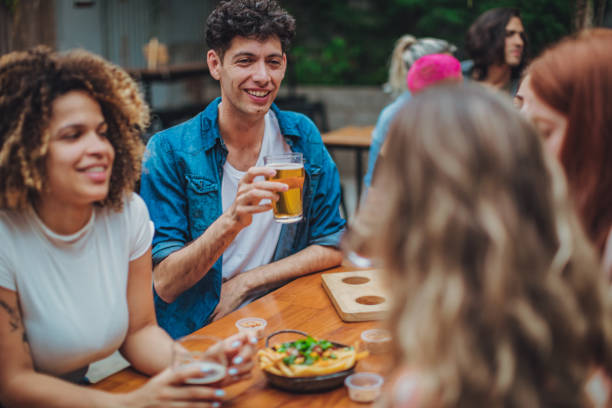 istock Friends drinking beer in pub 1192494490