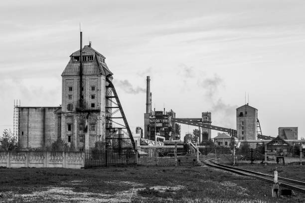 istock Old shale processing plant. Stylized black and white photo. 1192496828