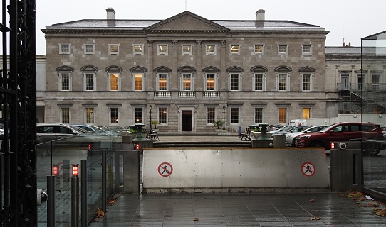 Dublin, Ireland. Government Buildings (the Irish Dail) on Kildare Street with security barrier raised.