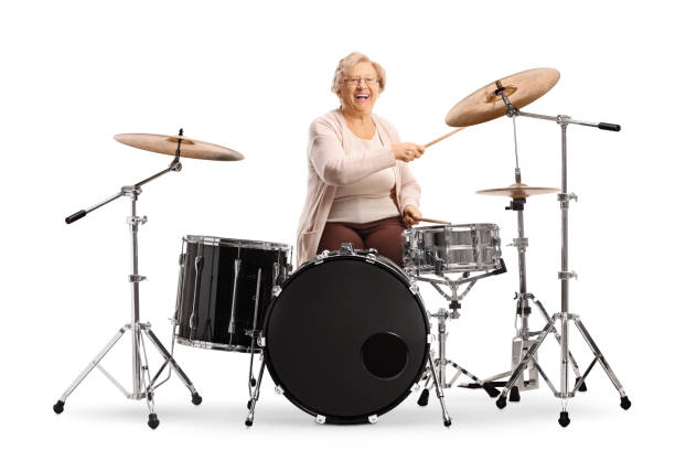 istock Elderly woman playing drums 1192496924