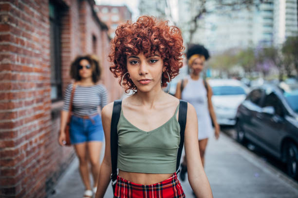 istock Three young women walking outdoors 1192497537