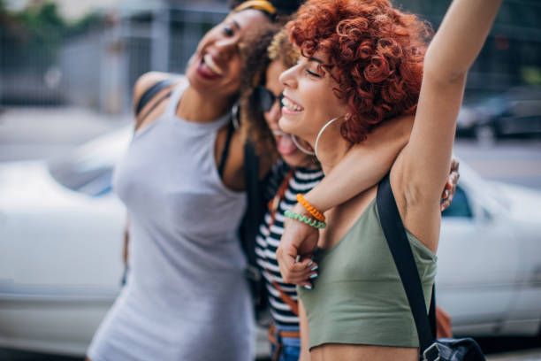 istock Three young women walking outdoors 1192497616