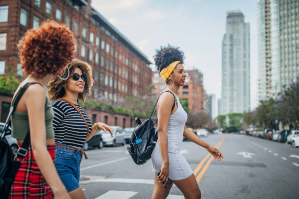 istock Three young women walking outdoors 1192497663