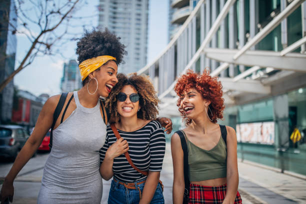 istock Three young women walking outdoors 1192497722