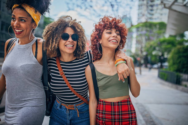 istock Three young women walking outdoors 1192498446