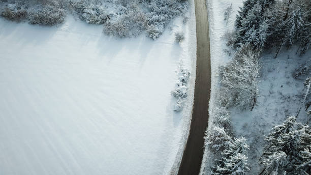 istock snowy Winter road from above 1192499189