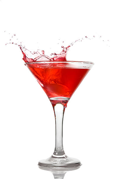 istock Red cocktail with splash isolated on white 119250398