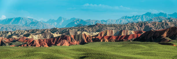 Zhangye Danxia Geopark rainbow mountains panorama China. Rainbow mountains in China near Zhangye. Zhangye Danxia Geopark panorama in China. Geological landforms. zhangye danxia geopark china stock pictures, royalty-free photos & images