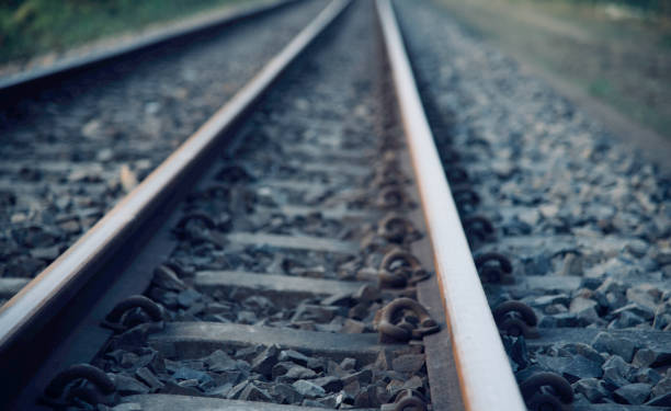 istock Straight railway tracks isolated unique photo 1192505388