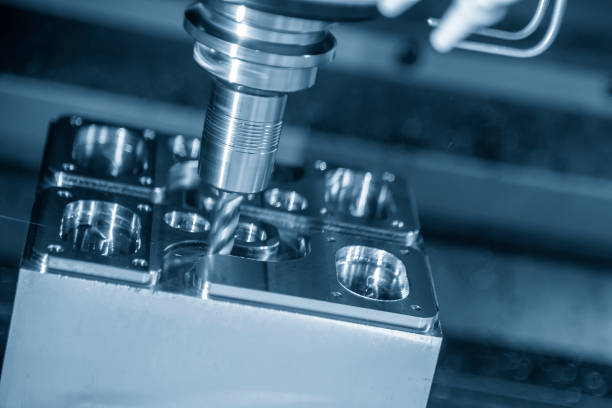 istock The CNC milling machine rough cutting the injection mold parts with the solid flat  endmill tools. 1192507584