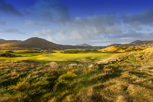 Stunning image of Green on a traditional links golf course. Golf was first played in Scotland on courses built on links land which is the land between the sea and the fertile arable land.