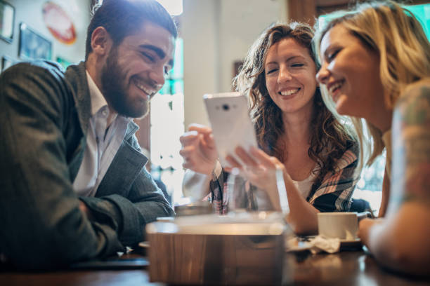istock Friends sitting in coffee shop 1192514015