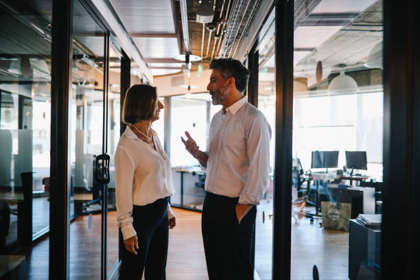istock Coworkers discussing a business project 1192515157