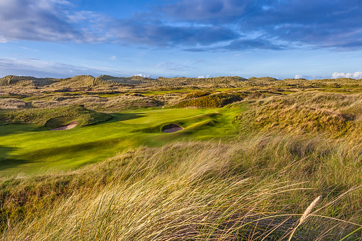 Stunning image of Green on a traditional links golf course. Golf was first played in Scotland on courses built on links land which is the land between the sea and the fertile arable land.