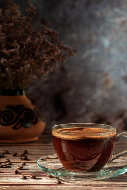 istock Cup of fresh aromatic coffee on a wooden table 1192516550