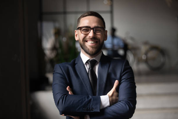 head shot close up portrait of happy businessman. - lawyer young adult suit expressing positivity imagens e fotografias de stock