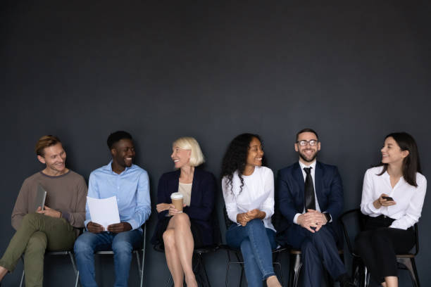 istock Happy different generations multiracial business people isolated on black background. 1192516645