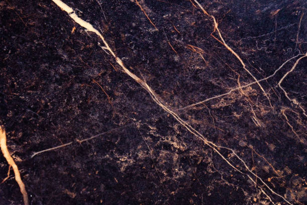 black marble with golden lines, natural black marble texture. white and yellow patterned natural details in dark grey marble. textured background for interior or product design - stone textured italian culture textured effect imagens e fotografias de stock