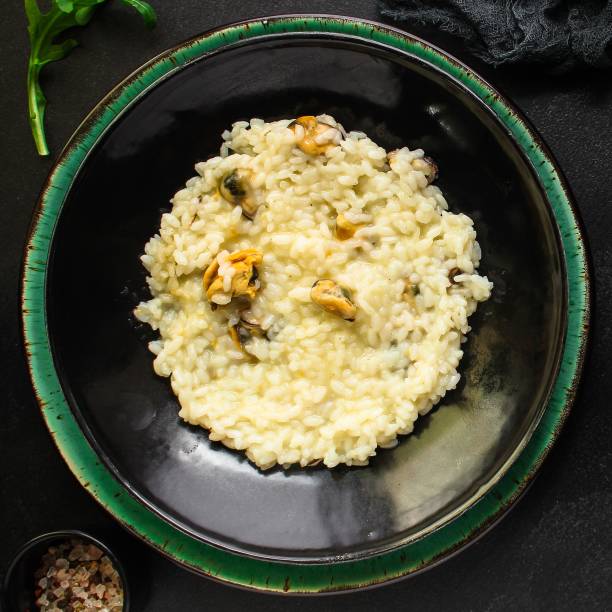 istock risotto mussels main course (delicious rice with seafood) menu concept. food background. top view. copy space 1192519737