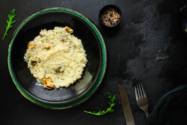 istock risotto mussels main course (delicious rice with seafood) menu concept. food background. top view. copy space 1192519745