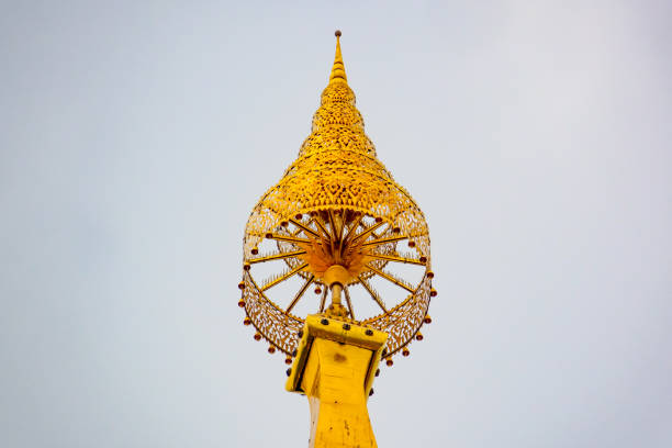 Wat Prathatphanom temple on blue sky and white cloud background, famous temple for buddist people and tourist