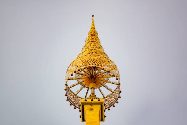 Wat Prathatphanom temple on blue sky and white cloud background, famous temple for buddist people and tourist