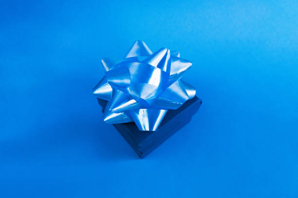 istock Blue gift box on the blue background, greeting card 1192525535