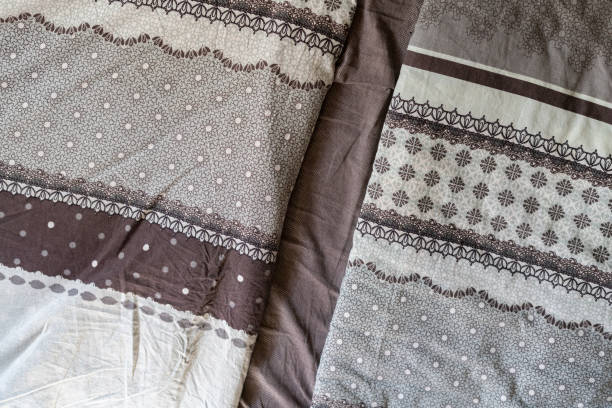 istock abstract black and white home bed textile with blankets and sheets 1192527127