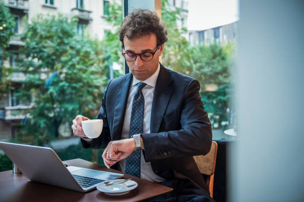 istock Businessman working at a cafe 1192529359