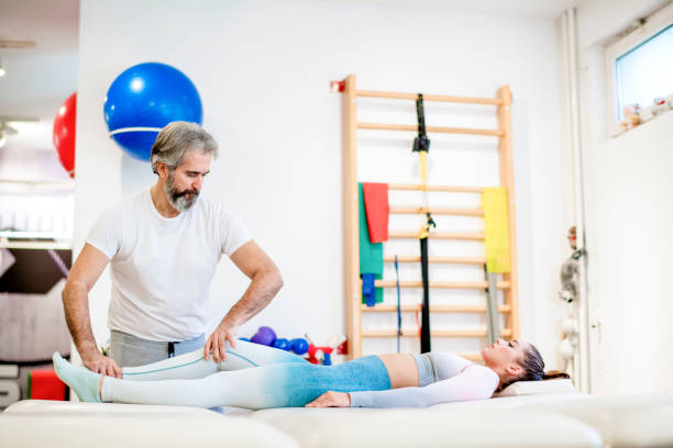 istock Young woman in physical therapy 1192530241