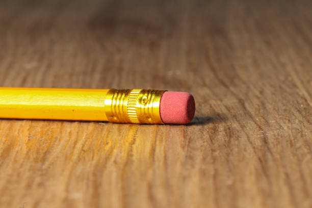 primo tempo di una gomma a matita gialla singola usata - pencil yellow single object office foto e immagini stock