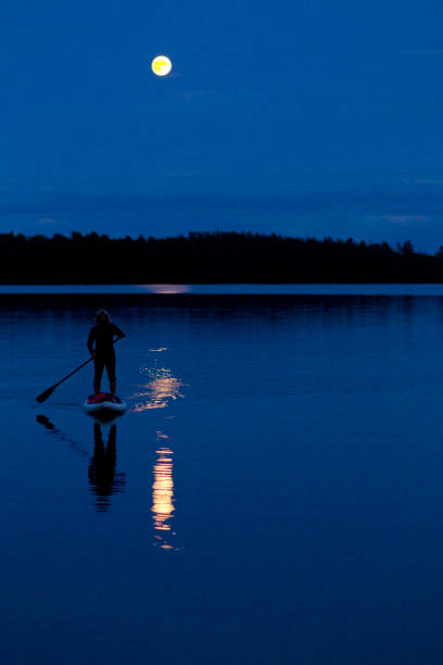 istock Moonlit Stand Up Paddleboard Trip 1192536934