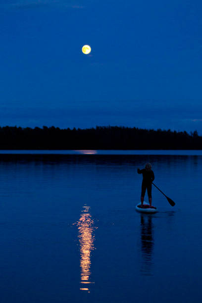 istock Moonlit Stand Up Paddleboard Adventure 1192536945