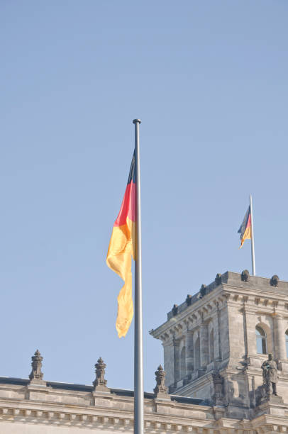 istock Germany national flag on Berlin's Reichstag (German Bundestag) 1192540374