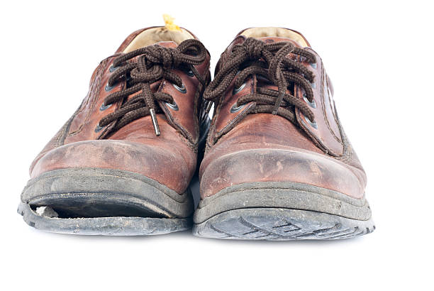 istock Old Shoes Isolated on White 119254467