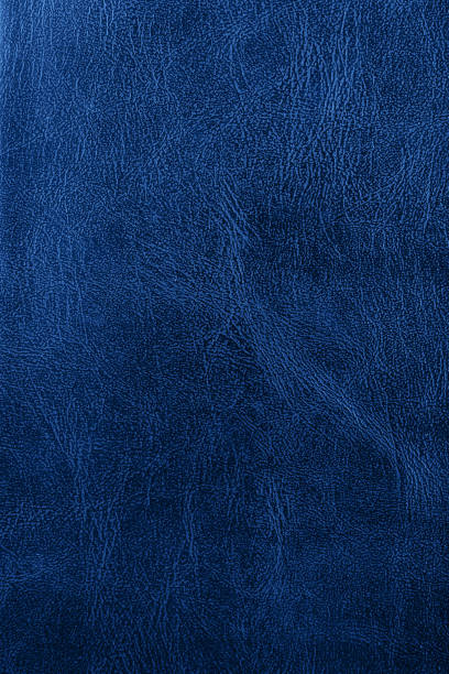 istock leather texture tinted in blue. background, blank, place for your text 1192549866