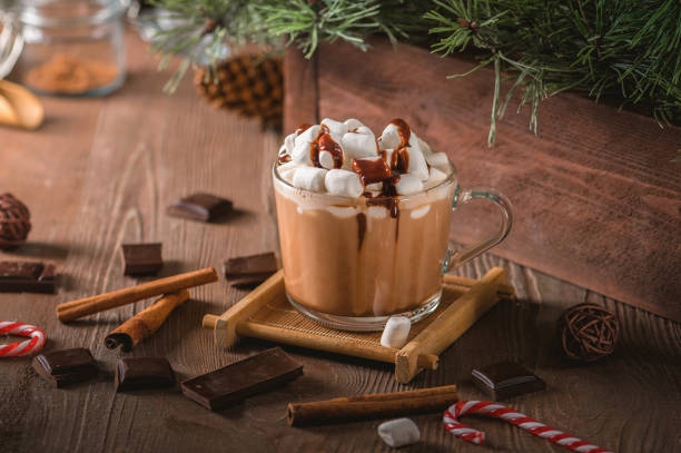 istock Glass cup of hot chocolate with marshmallows 1192550217