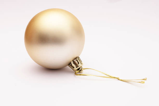Golden Christmas Baubles On White Background