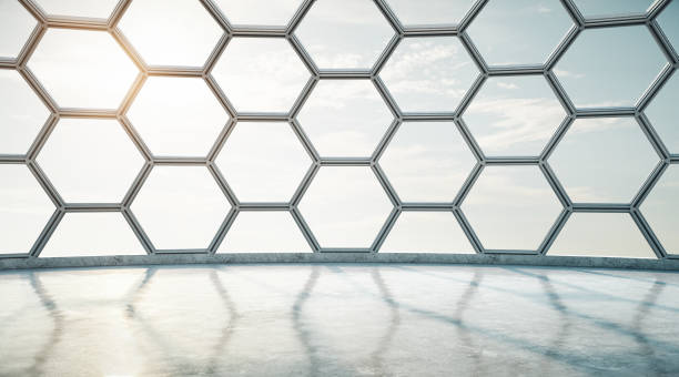 istock Futuristic window with cells and concrete floor in empty modern space. 1192557623