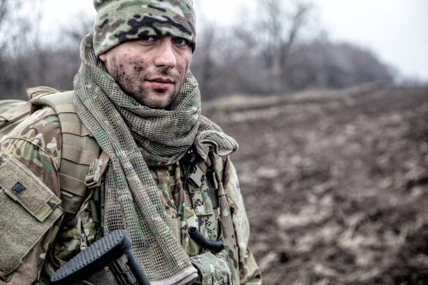 istock Portrait of modern army infantryman on march 1192563349