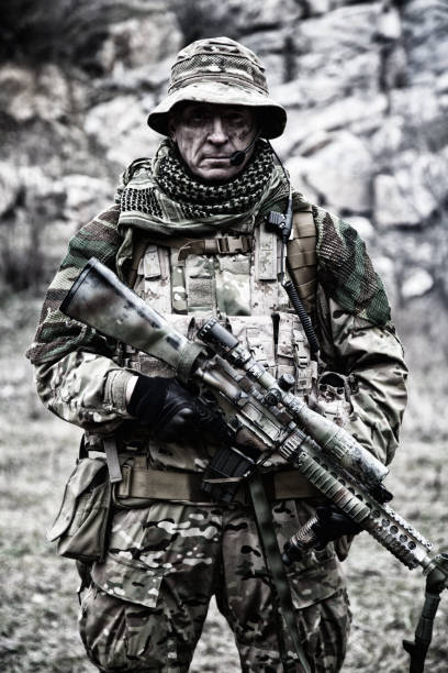 istock Army special forces veteran with service rifle 1192563453