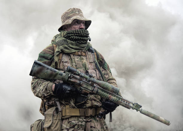 istock Brutal commando army soldier veteran armed sniper rifle 1192563462