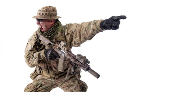 istock Army military soldier screaming, pointing attack direction 1192564620