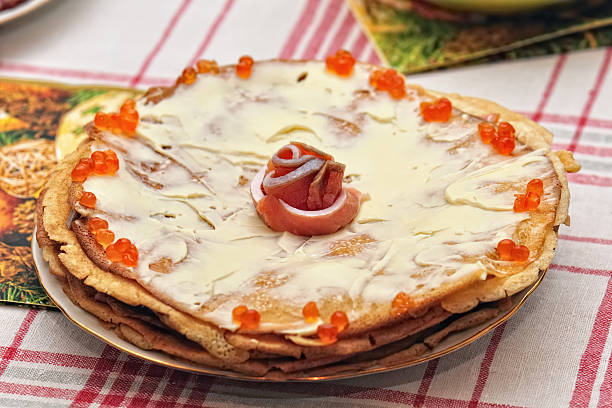 istock Pancakes pie with fish and red caviar 119257455