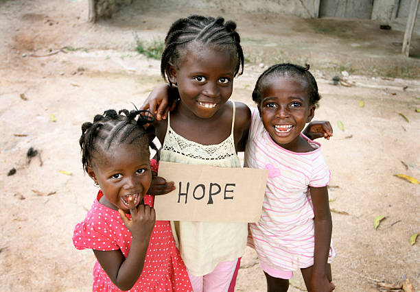 istock African Girls with Hope Sign 119257583