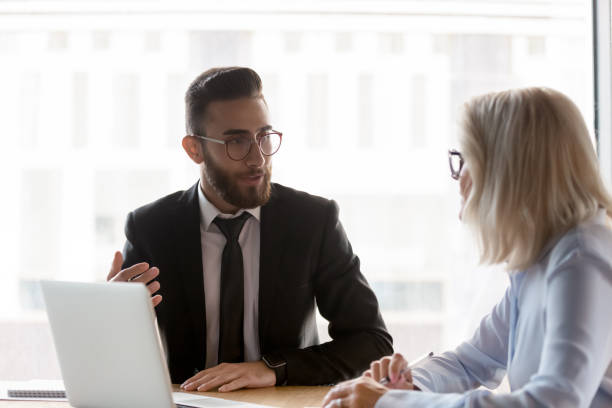 istock Diverse businesspeople talk discussing ideas at meeting 1192578948
