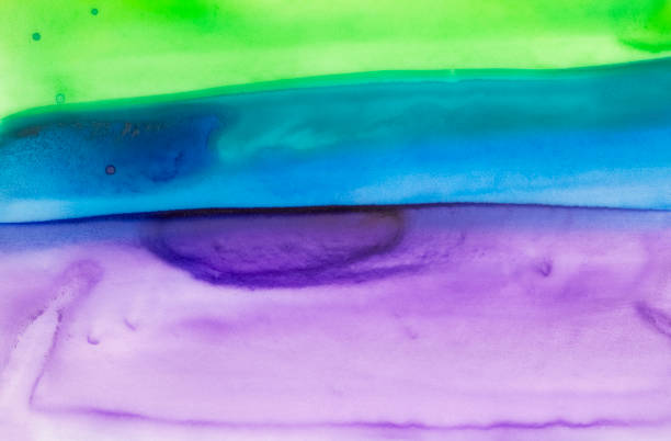 istock Creative artistic multi-colored background with yellow-green, teal blue and purple colors. Handdrawn liquid water color graphic paint. Beautiful abstract backdrop for design, card, banner, wallpaper. 1192581523