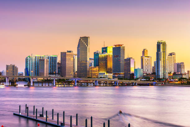 Miami, Florida, USA skyline on Bisayne Bay Miami, Florida, USA skyline on Bisayne Bay at dusk. miami photos stock pictures, royalty-free photos & images