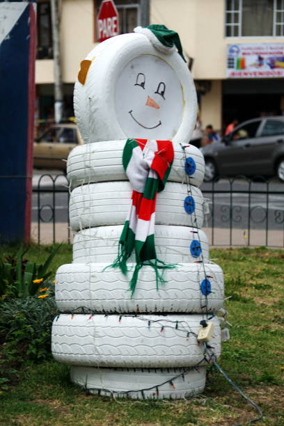 Snowman Christmas decoration made from tires in Matriz Park in Cotacachi, Ecuador
