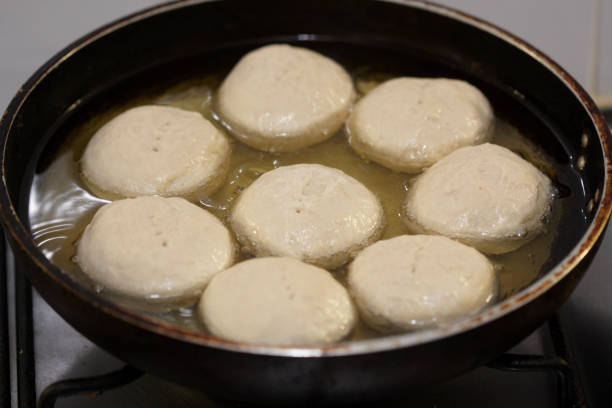 istock West Indian Johnny Cakes Being prepared And Cokked 1192584416